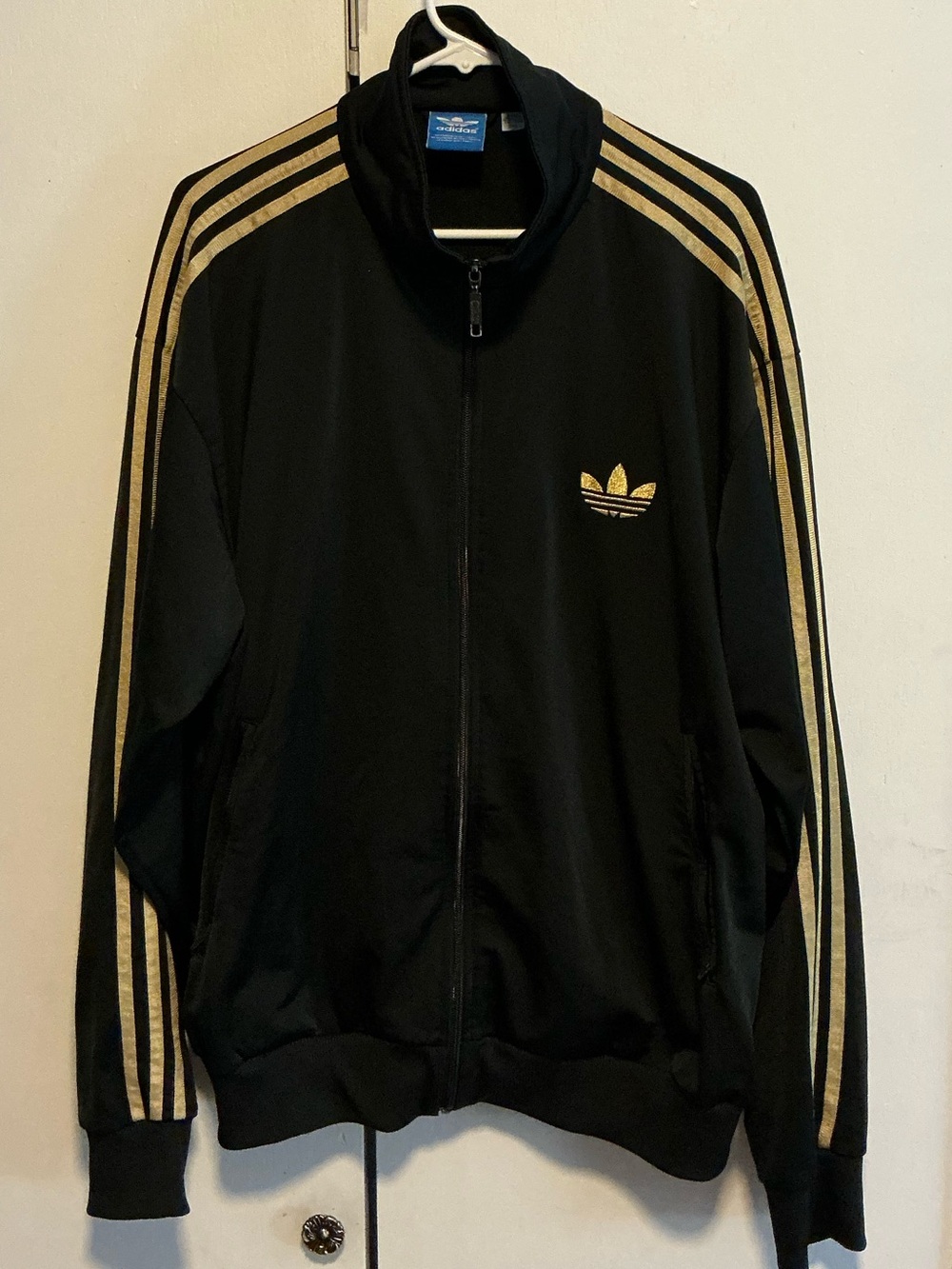 adidas Black Jacket with Gold Stripe Accents